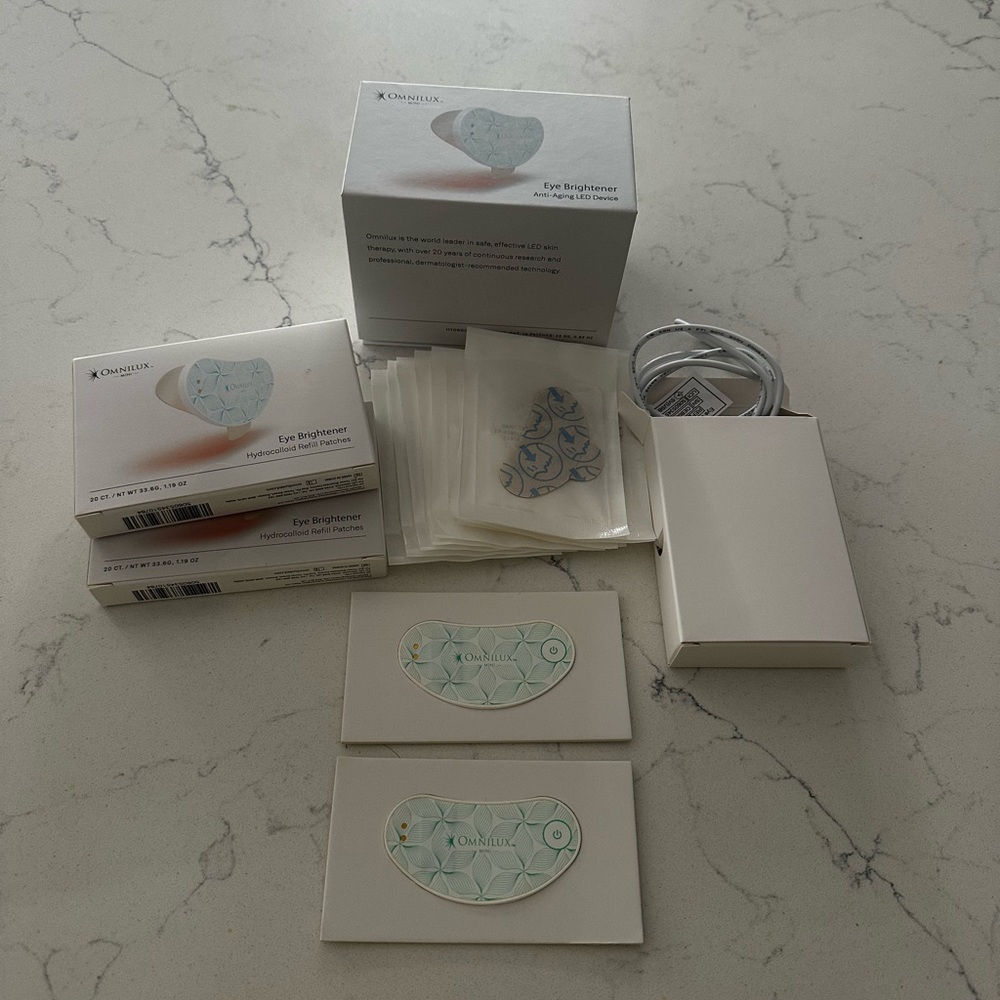 Like New! 2 Omnilux Eye Brightener Skincare Tools and 50 refill patches!